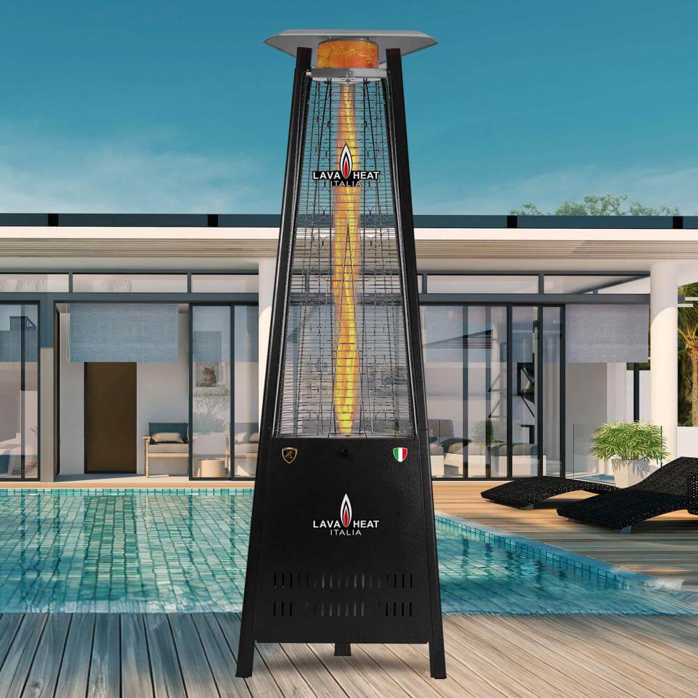 A black Capri heater standing outdoors in front of a pool.