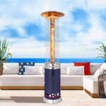 Blue Fire Fountain heater outdoors in front of sofas