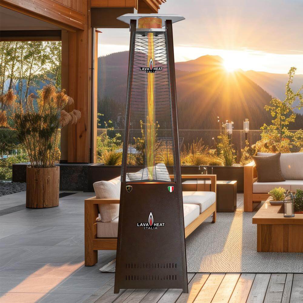 Bronze Lava Lite heater outside in front of sofas at sunset