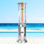 Silver Opus heater outside in front of sofas at night